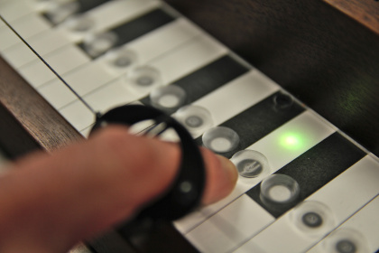 New built-in tuner hidden underneath fingerboard